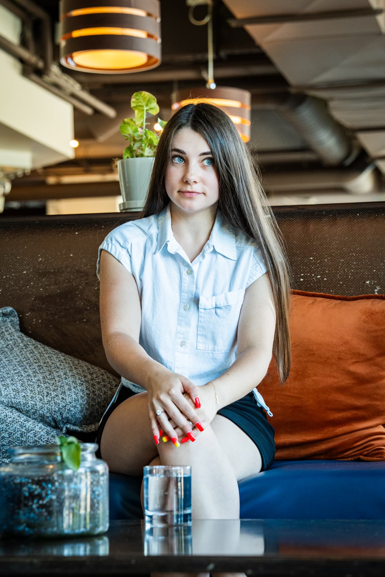 A model on a sofa during a lifestyle shoot